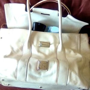 Dooney& Bourke egg white colored handbag leather is perfectly broken in